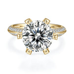 Irina Round Moissanite Claw Prong Pavé Engagement Ring in 18K yellow gold plating, front view
