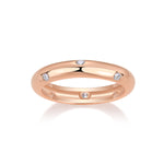 Jessa Round Moissanite Flush Set Eternity Band in 18K rose gold plating, front view
