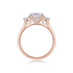 Katrina Round Moissanite Three Stone Engagement Ring in 18K rose gold plating, front view