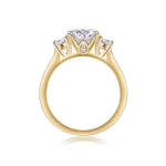 Katrina Round Moissanite Three Stone Engagement Ring in 18K yellow gold plating, front view
