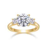 Katrina Round Moissanite Three Stone Engagement Ring in 18K yellow gold plating, front view