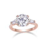 Kayla Round Moissanite Three Stone Engagement Ring in 18K rose gold plating, front view