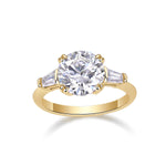 Kayla Round Moissanite Three Stone Engagement Ring in 18K yellow gold plating, front view