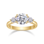 Kenzie Round Moissanite Three Stone Engagement Ring in 18K yellow gold plating, front view