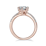 Kimber Round Moissanite Twist Solitaire Engagement Ring in 18K rose gold plating, front view