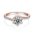 Kimber Round Moissanite Twist Solitaire Engagement Ring in 18K rose gold plating, front view