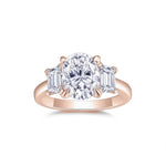 Kristen Oval Moissanite Three Stone Engagement Ring in 18K rose gold plating, front view