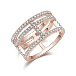 Leona Moissanite Pavé Triple Row Ring in 18K rose gold plating