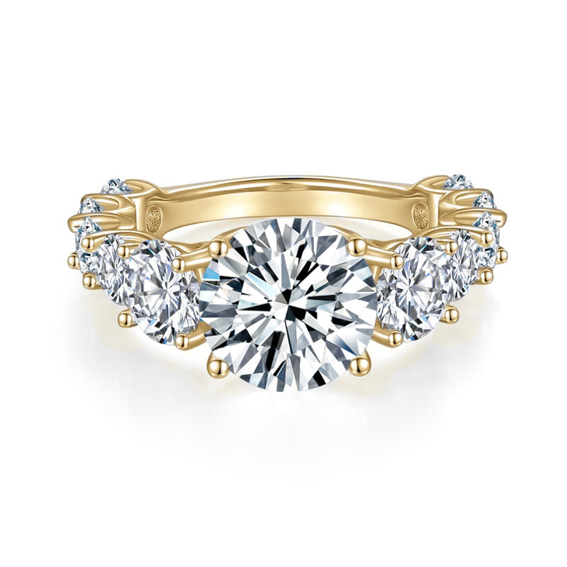 Liv Round Moissanite Graduated Side Stone Engagement Ring in 18K yellow gold plating, front view