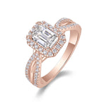 Maya Emerald Cut Moissanite Halo Engagement Ring in 18K rose gold plating, angled view