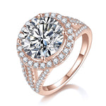 Mckenna Round Moissanite Openwork Halo Engagement Ring in 18K rose gold plating