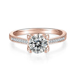 Meadow Round Moissanite Solitaire Engagement Ring in 18K rose gold plating, front view