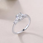 Carissie Round Baguette Accent Trilogy Engagement Ring 1 Ct