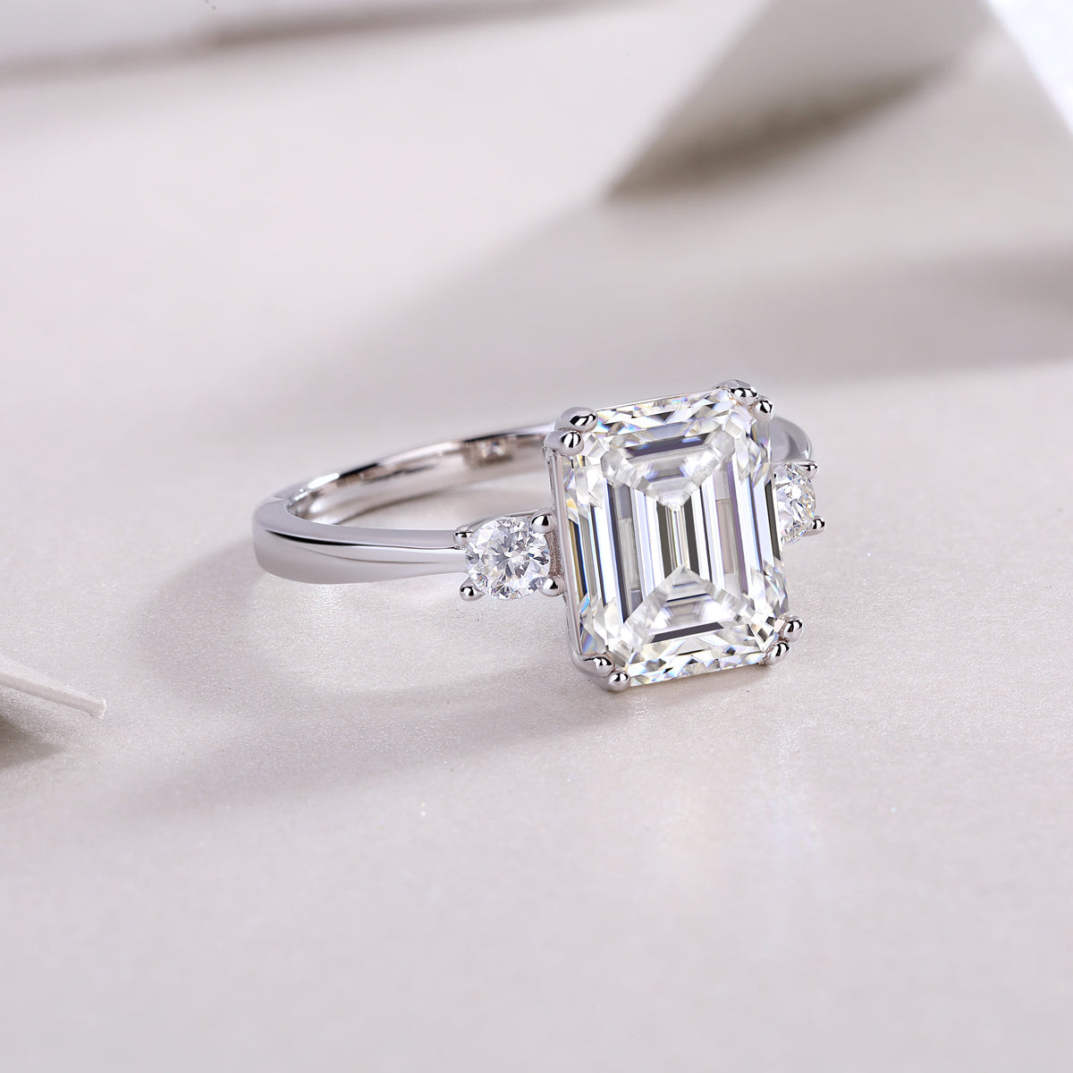 Carissie Classic Emerald Cut Three-Stone Engagement Ring