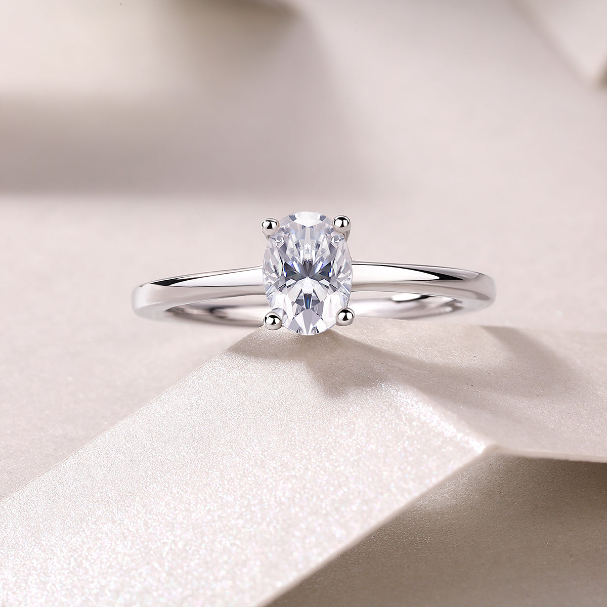 Carissie Classic Oval Solitaire Four-Prong Engagement Ring