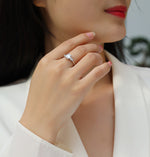 Carissie Emerald Cut Tapered Baguette Claw-Set Engagement Ring