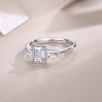 Carissie Emerald Cut Tapered Baguette Claw-Set Engagement Ring