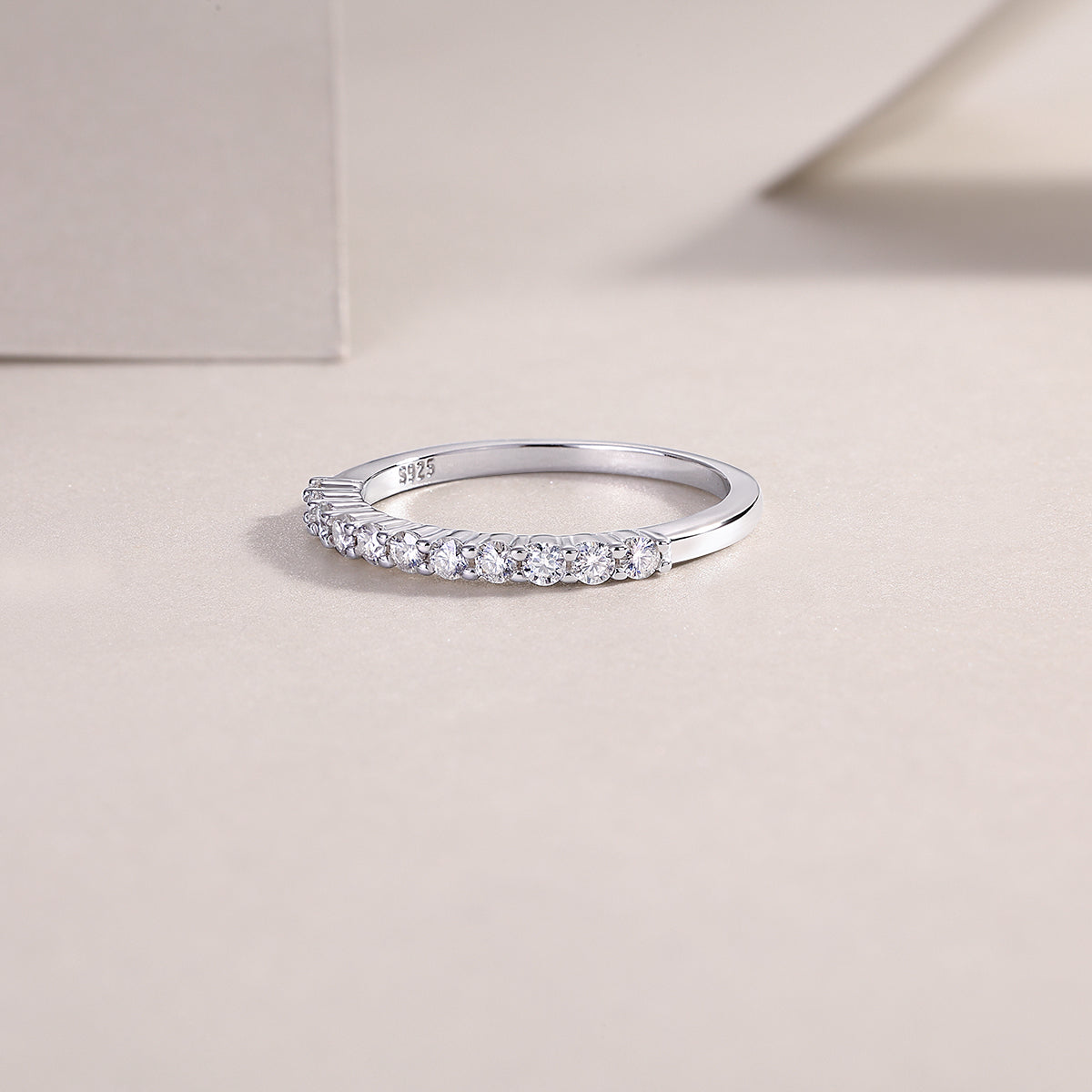 Carissie Elegant Half Eternity Prong Set Wedding Band