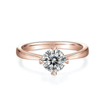 Nia Round Moissanite Solitaire Engagement Ring in 18K rose gold plating, front view