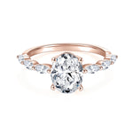 Oriana Oval Moissanite Side Stone Engagement Ring in 18K rose gold plating, front view