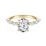 Oriana Oval Moissanite Side Stone Engagement Ring in 18K yellow gold plating, front view