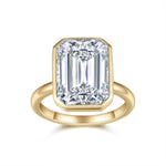 Petra Emerald Cut Moissanite Bezel Engagement Ring in 18K yellow gold plating, front view