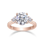 Ramona Round Moissanite Side Stone Engagement Ring in 18K rose gold plating, front view