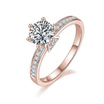 Reese Round Moissanite Channel Set Engagement Ring in 18K rose gold plating, angled view