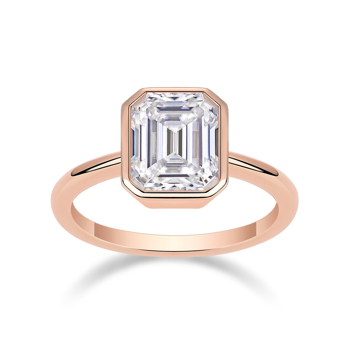Thea Emerald Cut Moissanite Bezel Engagement Ring in 18K rose gold plating, front view