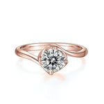 Tia Round Moissanite Twist Engagement Ring in 18K rose gold plating, front view