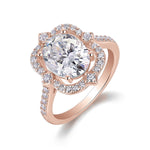 Viola Oval Moissanite Floral Halo Engagement Ring in 18K rose gold plating, front view